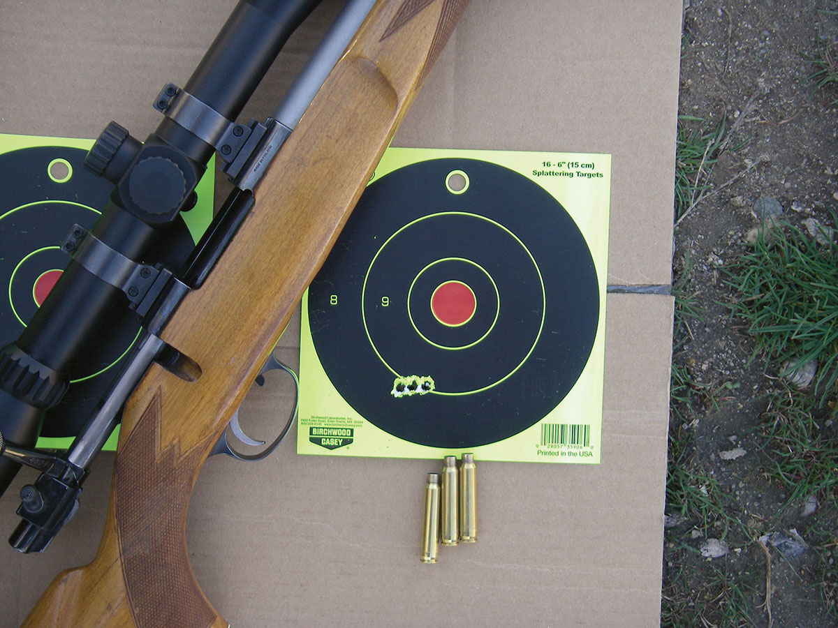 This three-shot group was fired in 20- to 30-mph wind gusts, which explains the stringing. Groups obtained in good conditions hovered around 3/8 inch at 100 yards, including some .5-inch groups with both the pistol and rifle.