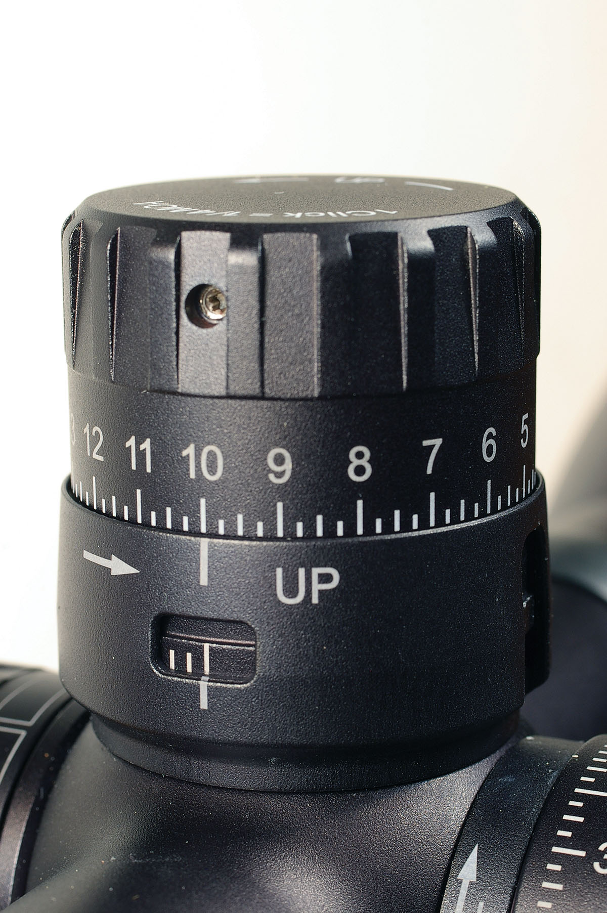 The elevation turret is the hub of the Swarovski X5(i) scope. With an exterior ballistic chart for a certain load, the turret can be adjusted to compensate for bullet drop at extended ranges. A rotation indicator ring can be lifted to allow turning the reticle below its zero stop up to 10 MOA.