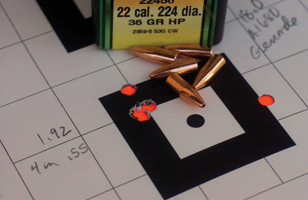 This one-hole, three-shot group (or .55-inch four-shot group) ended up being 1.92 inches after one shot was yanked by wind or shooter.