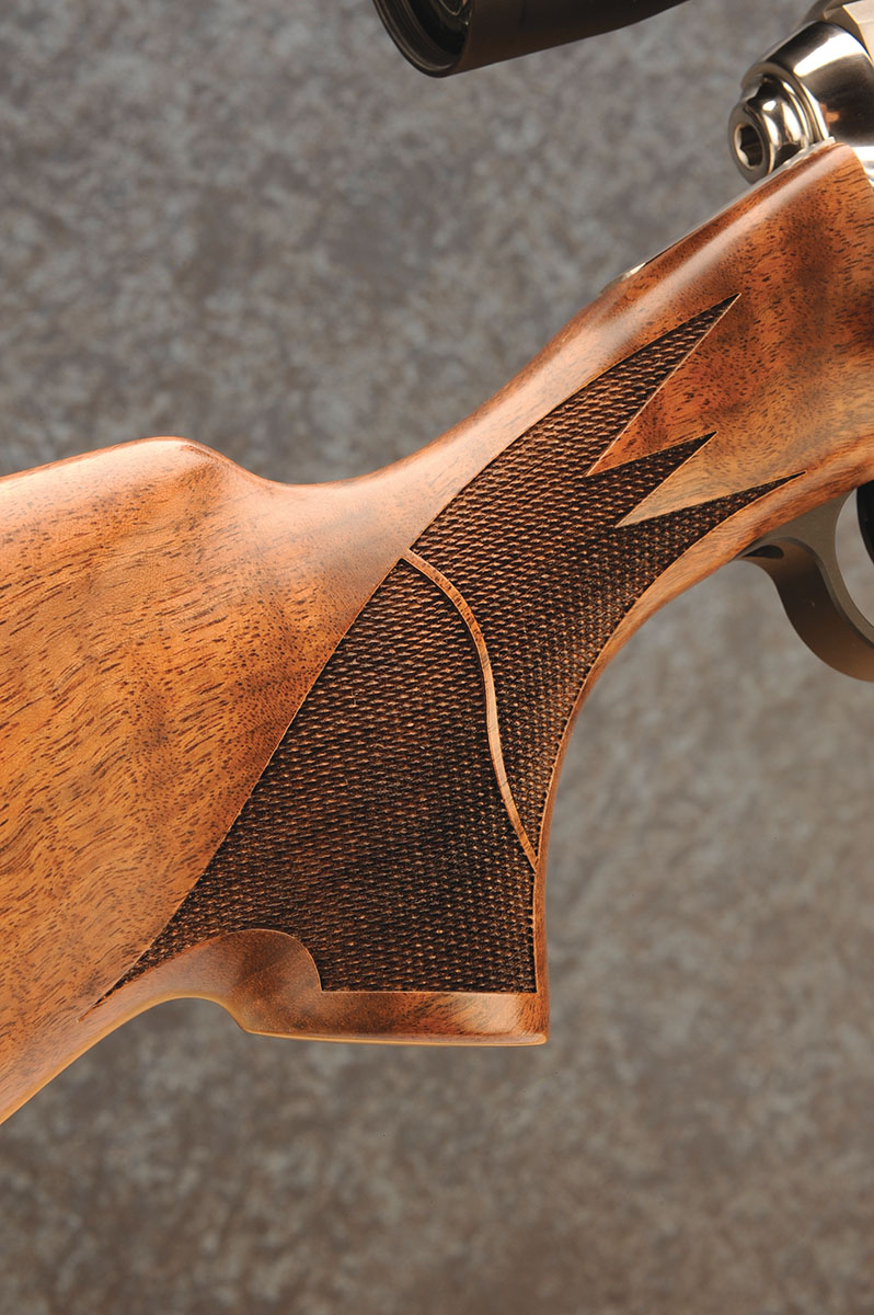 Checkering includes a ribbon to enhance the pattern. Checkering is 22 lines per inch; diamonds are well-pointed and cut without any overruns.