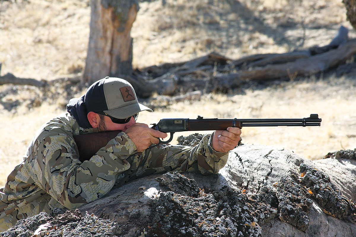 A big log isn’t exactly like going prone at Camp Perry, but it gets the job done!
