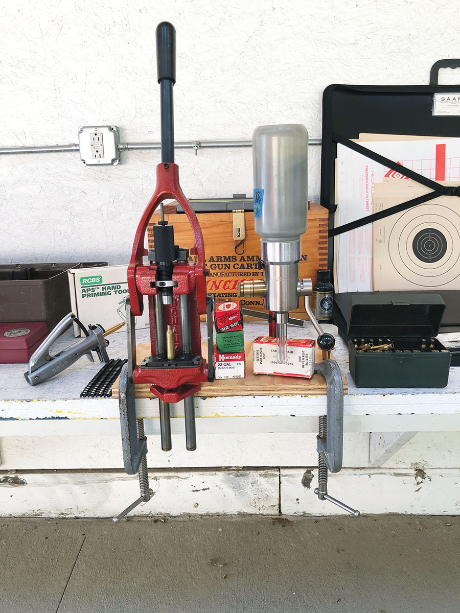 Randy did all the load development at the range. The reloading tool mounting board, C-clamps, and all the tools and components shown in this photo, plus some others, fit nicely in the 16x10x10-inch Winchester box in the background.