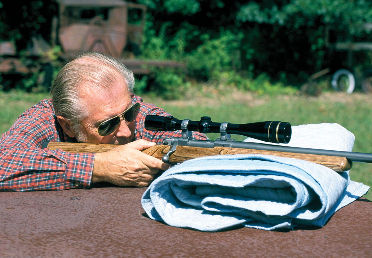 Out on the farm, Stan always has a rolled blanket in his Jeep for a good rest when shooting his 220 Weatherby Rocket.
