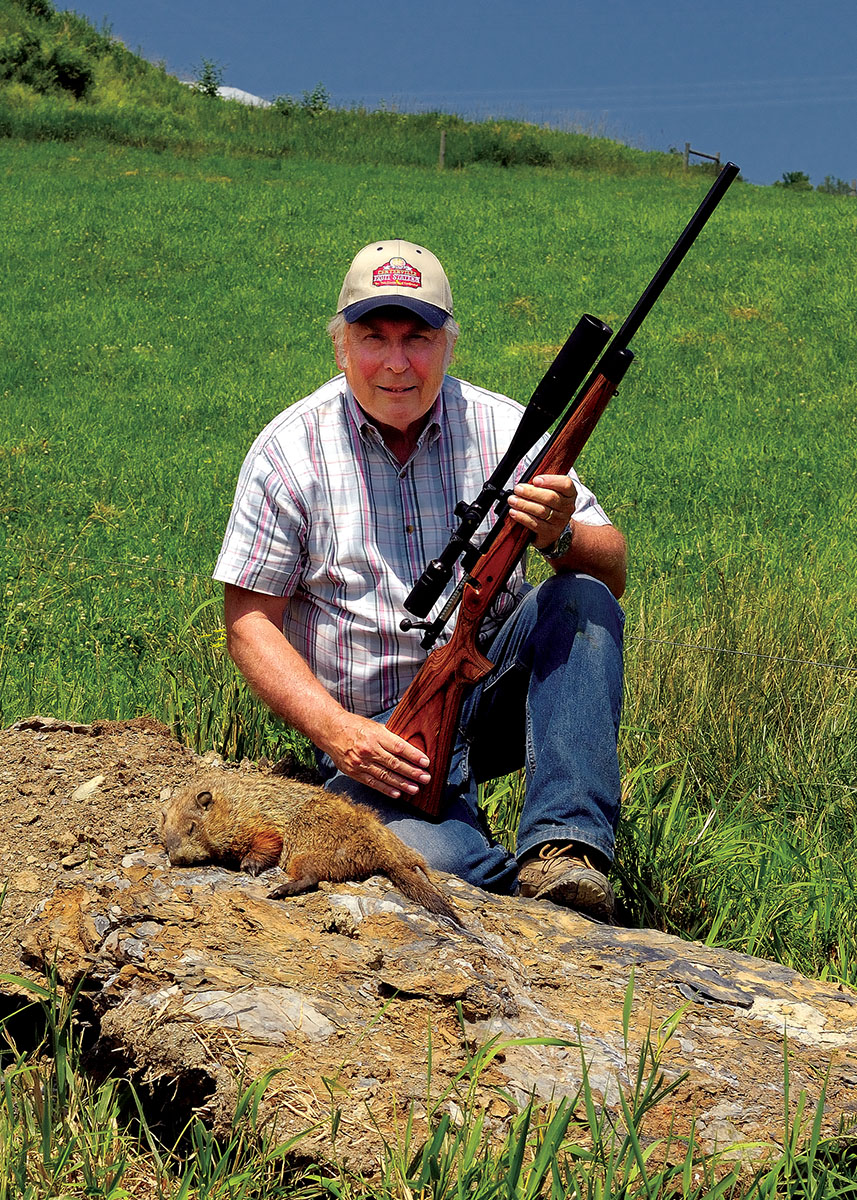 Out in New York state, Trzoniec used his 6mm Remington to anchor this chuck. It was taken just in front of that boulder in the background on a nice, balmy summer’s day.