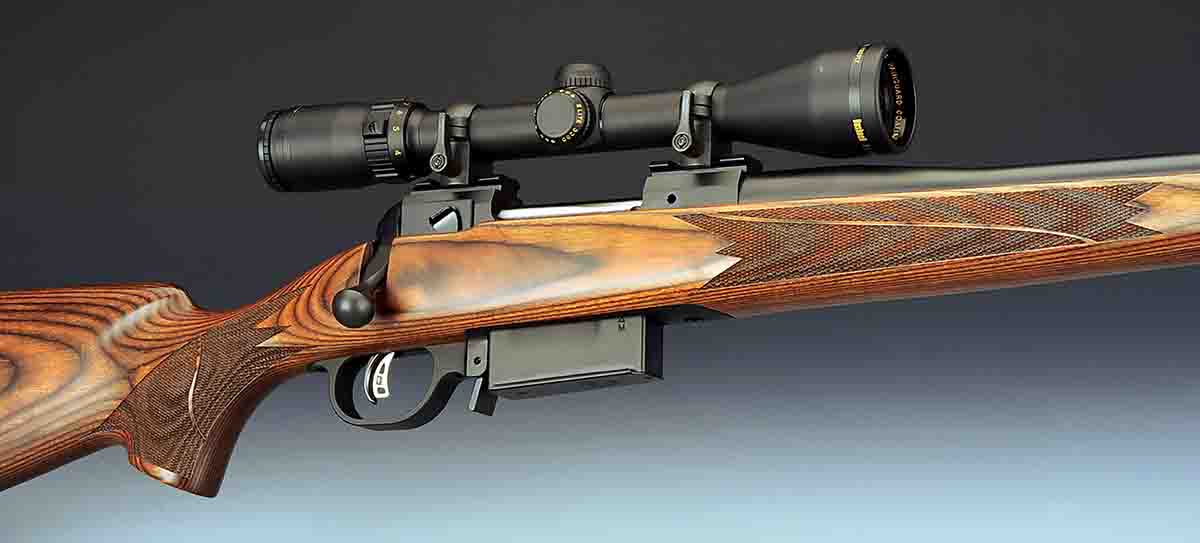 From any angle, this Mark X has the look and feel of a rifle ready for action in the field. The stock is profiled in a semi-classic design, finished smooth and has point checkering with a ribbon for the custom look. The scope is a Bushnell Elite 3200 3-9x 40mm.