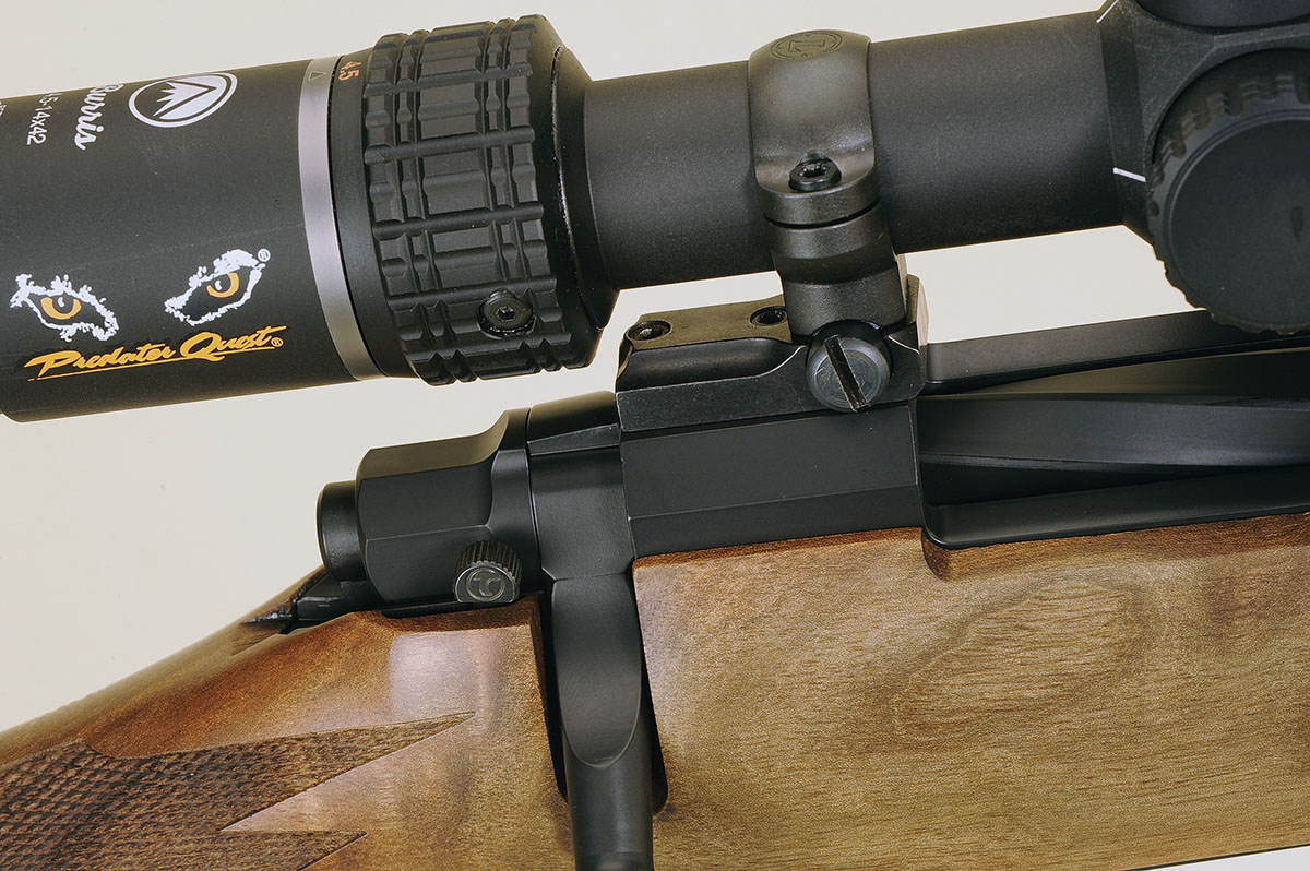 Take note of the checkered bolt handle, the closeness of the stock to the action and the spiral-fluted bolt and the safety lever.