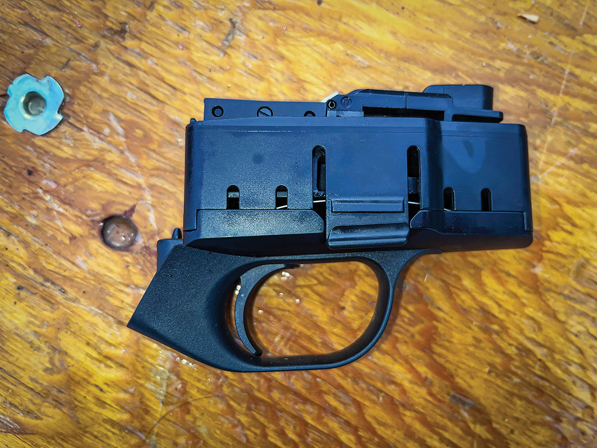 The magazine and entire trigger assembly pop out of the rifle as one group. The magazine fed  flawlessly, and the trigger maintained a crisp  1¾-pound pull through many magazine exchanges.
