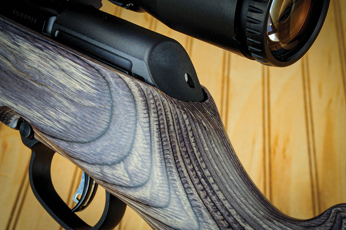 The details on the gun are evident here. Take note of the close inletting around the bolt shroud and the fine fit and finish. The hole at the rear of the shroud is to part it from the action for maintenance of the bolt.